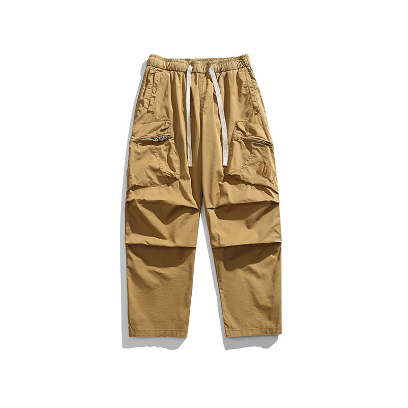Men's loose-fitting cargo pants with elastic drawstring waist, cord drawstring, and large utility pockets Mune Fashion