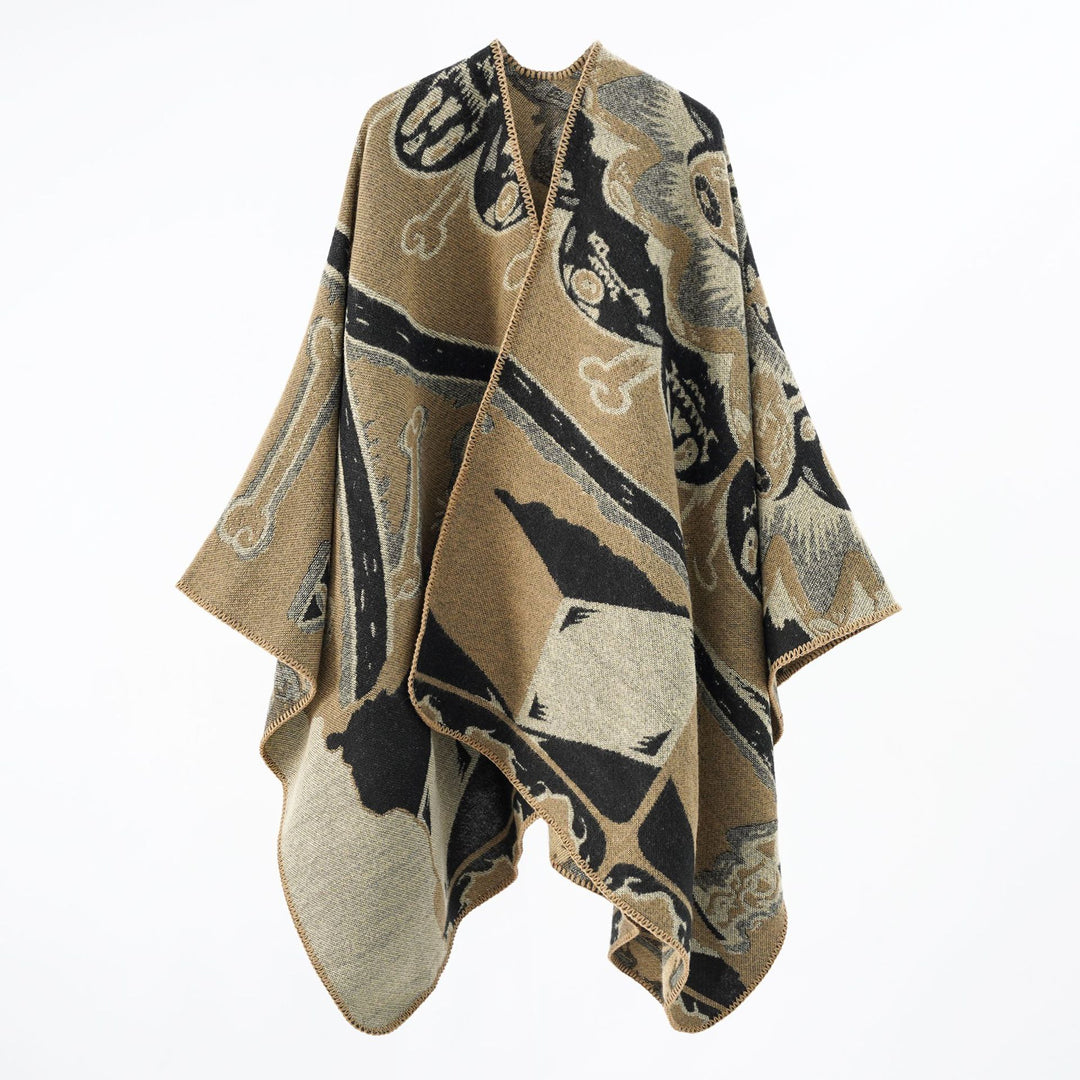 Women's statement cape poncho made from jacquard woven wool blend with skull and bone pattern Mune Fashion