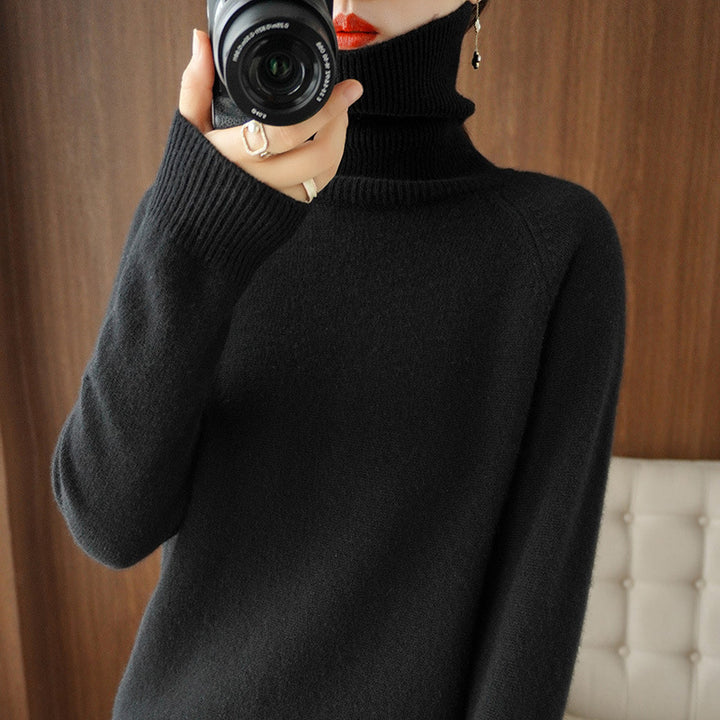 Women's turtleneck sweater made of soft wool blend with extended cuffs Mune Fashion