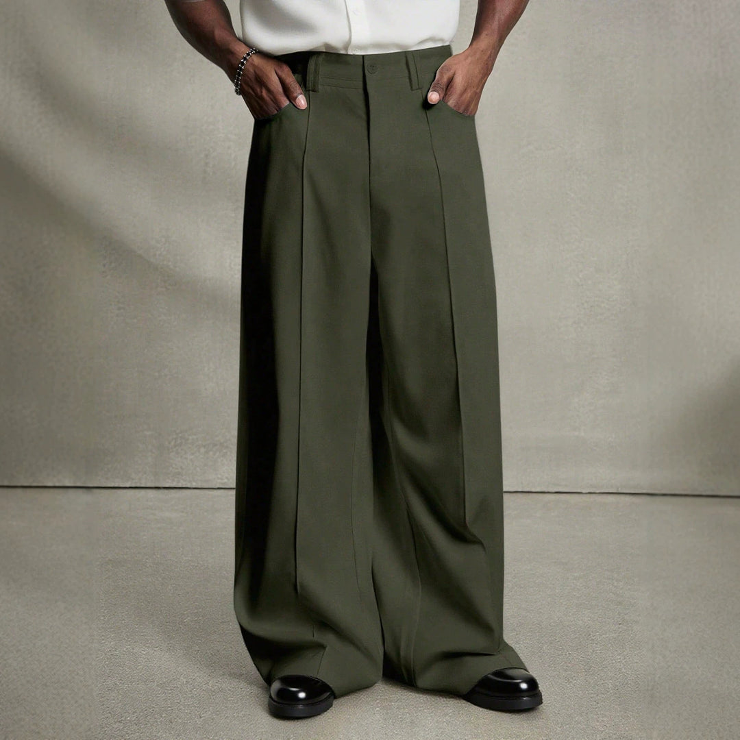 Men's wide pleated pants with high waistband, precise creases, and side inset pockets Mune Fashion