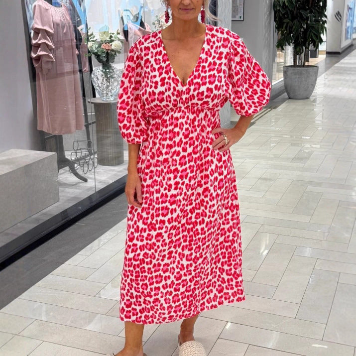 Women's maxi dress with deep V-neck, voluminous puff sleeves, and smocked waist seam Mune Fashion