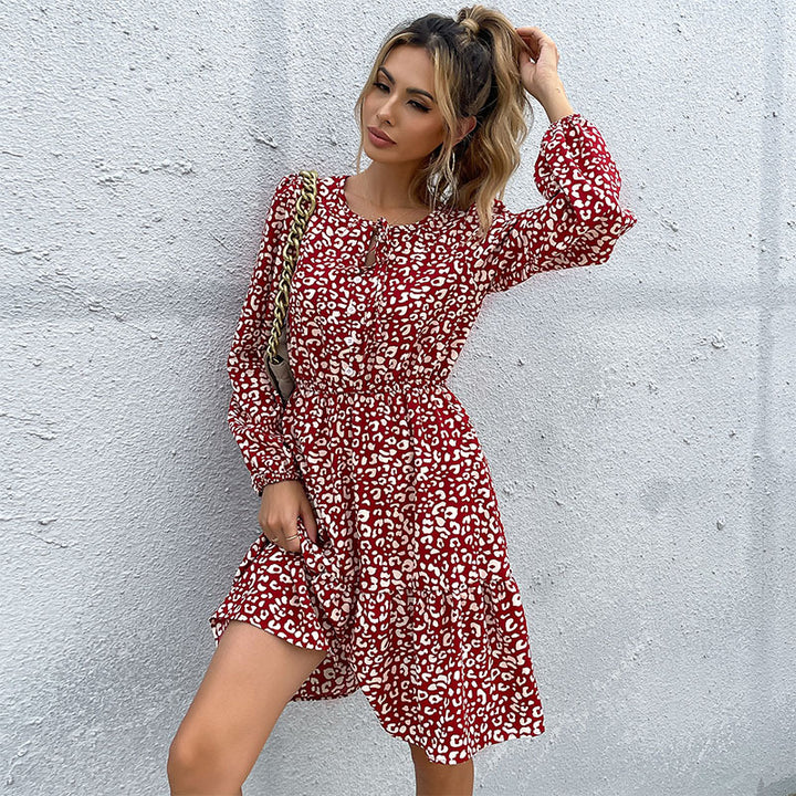 Women's leopard print ruffle dress with tie bow, elastic waistband, and long sleeves Mune Fashion