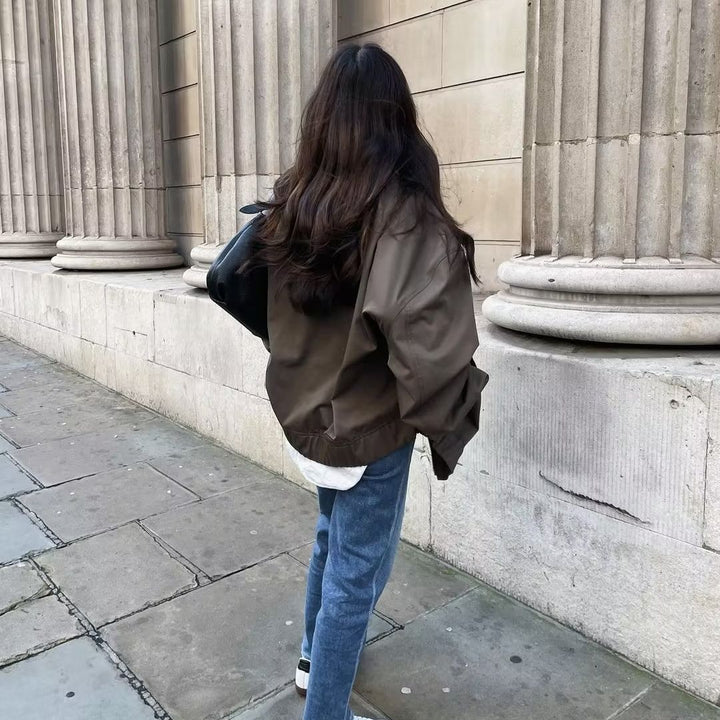 Unisex nan lighter oversized bomber jacket with continuous metal zipper, ribbed collar, and elastic hem Mune Fashion