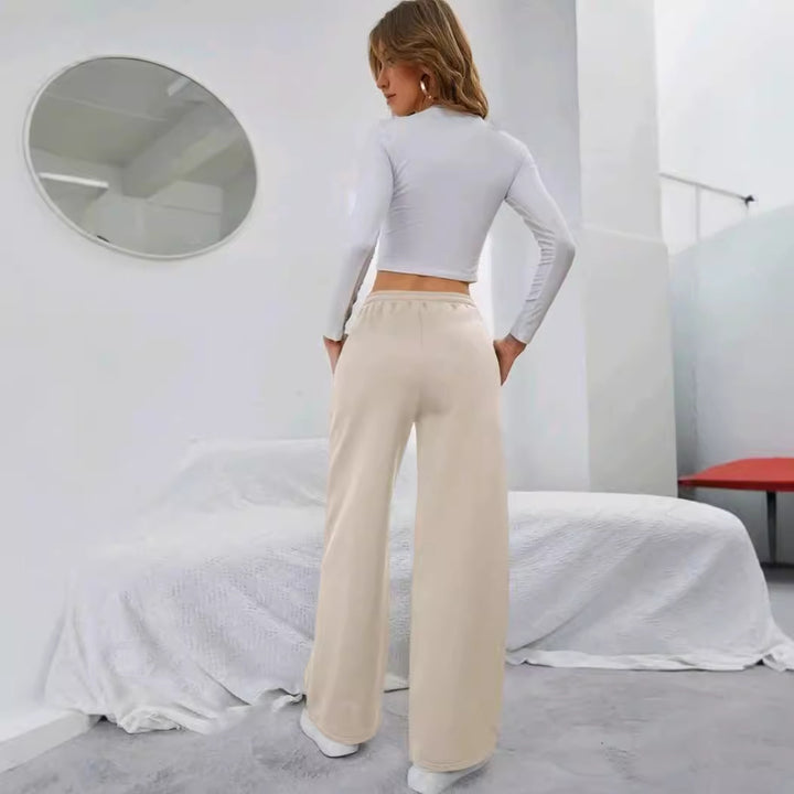Women's High-Waist Wide-Leg Jogging Pants with elastic comfort waistband, drawstring, and deep side pockets Mune Fashion