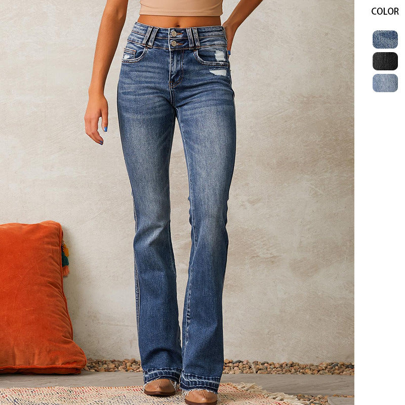 Ladies high-waisted vintage bootcut jeans with double button fly, light destroyed detail, and frayed hem Mune Fashion