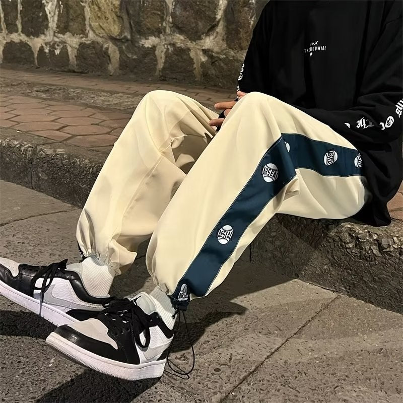 Men's fashionable sports pants with side graphic print Mune Fashion
