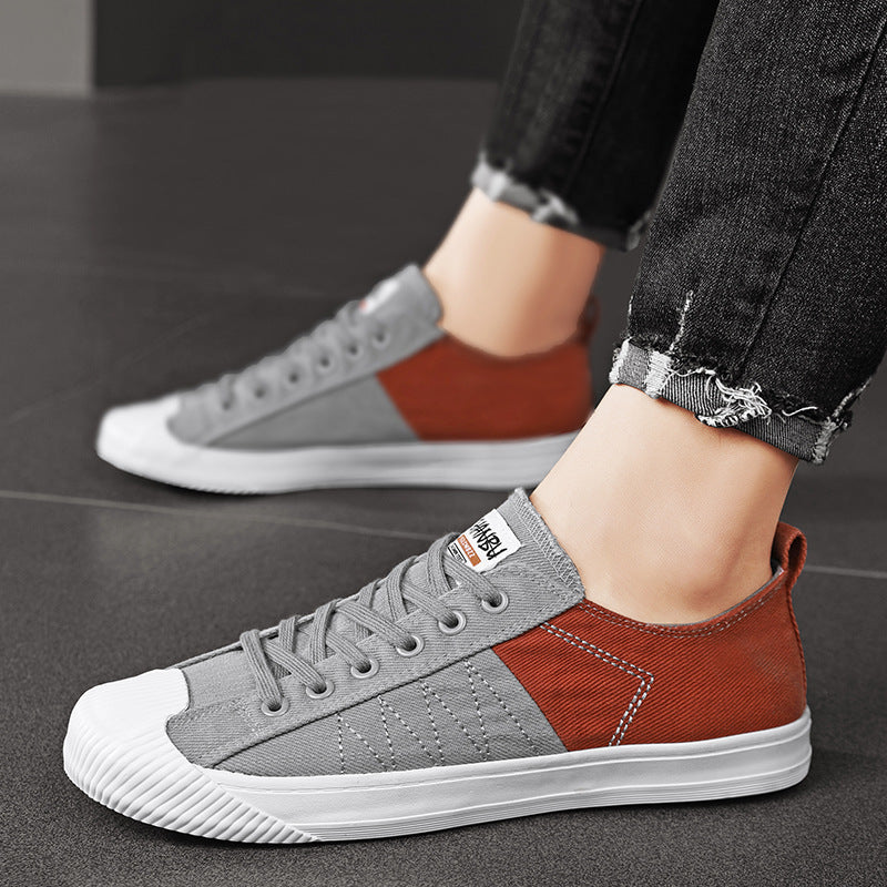 Unisex low canvas sneakers with reinforced rubber toe cap and contrasting textile panels Mune Fashion