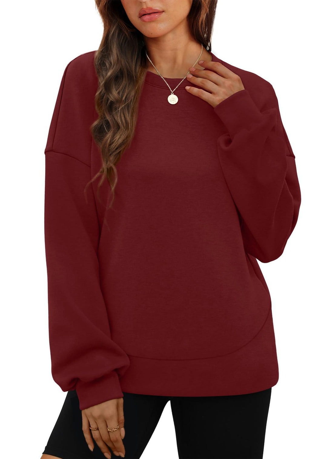 Women's casual oversized round neck sweatshirt with dropped shoulder, rounded hem, and soft inner lining Mune Fashion