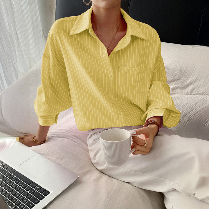 Women's slightly tailored long blouse with Kent collar, breast pocket, and fine pinstripes Mune Fashion