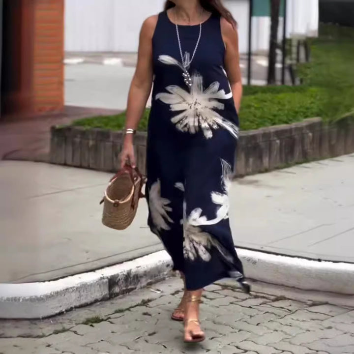 Women sleeveless casual maxi dress made of lightweight jersey with large brush flower pattern and hidden side pockets Mune Fashion