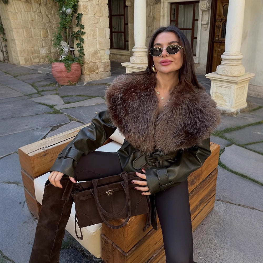 Women's tailored faux leather jacket with voluminous faux fur shawl collar and tie belt Mune Fashion