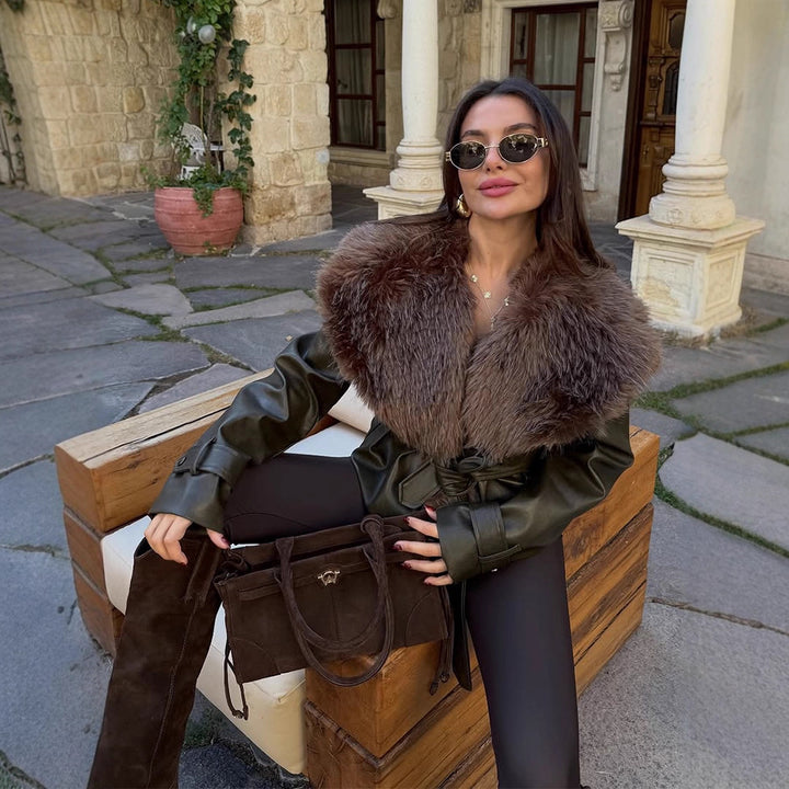 Women's tailored faux leather jacket with voluminous faux fur shawl collar and tie belt Mune Fashion