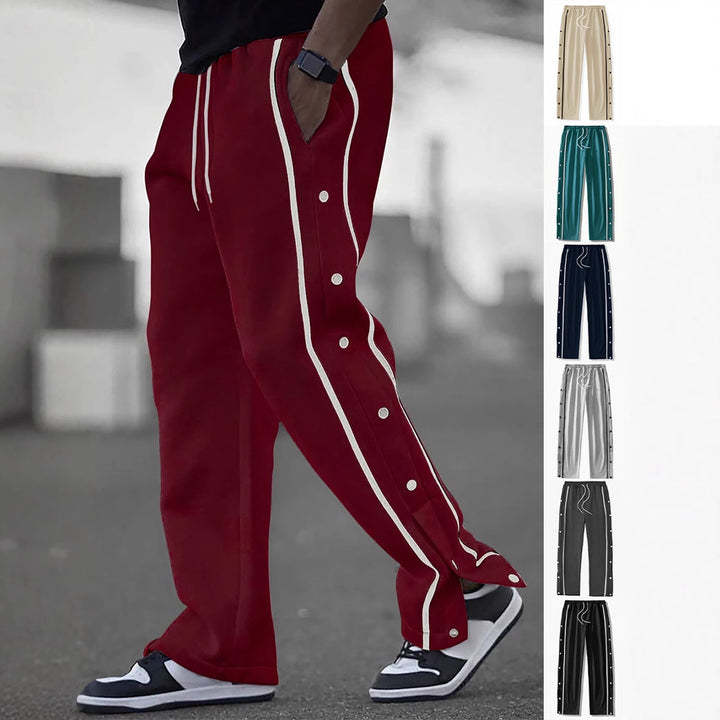 Men's casual training pants with side snap button placket, elastic waistband and contrasting piping Mune Fashion