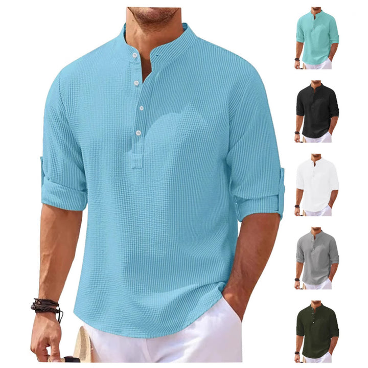 Women's oversized long sleeve Henley with stand-up collar waffle texture and sleeve fastening Mune Fashion