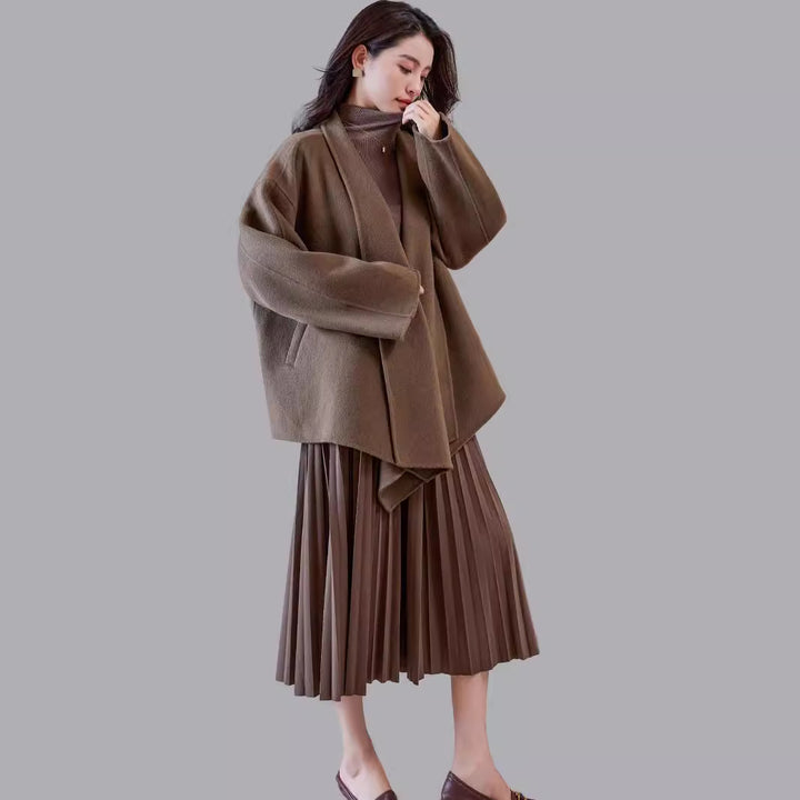Women's oversized coat made from wool blend with open shawl collar and asymmetrical hem Mune Fashion