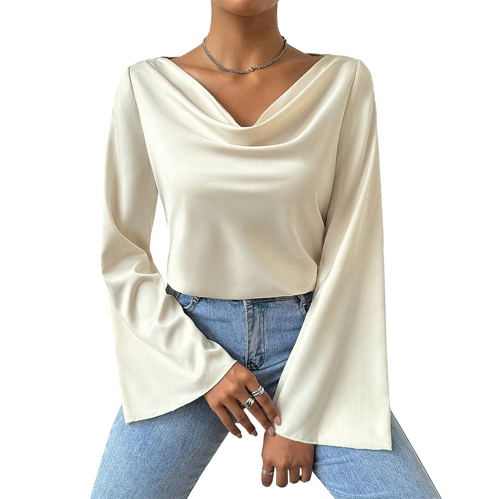 Women's blouse with waterfall neckline, wide trumpet sleeves and flowing satin look.