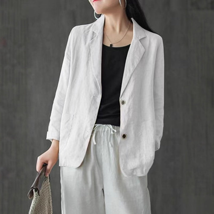 Women's linen blazer in a casual style with a loose fit and patch pockets