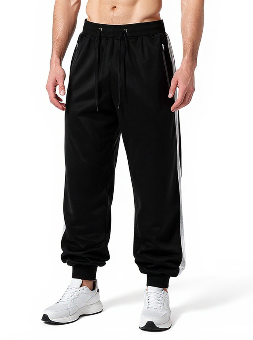 Men's sporty jogging pants with elastic waistband and side zip pockets Mune Fashion