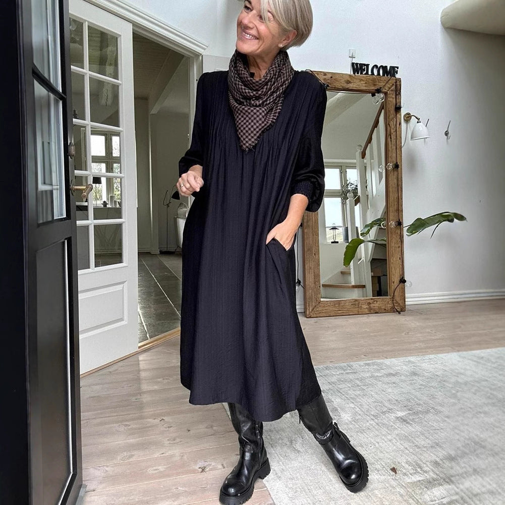 Ladies' loose midi dress with fine pleated look, stand-up collar, short button placket, smocked cuffs, and side pockets Mune Fashion