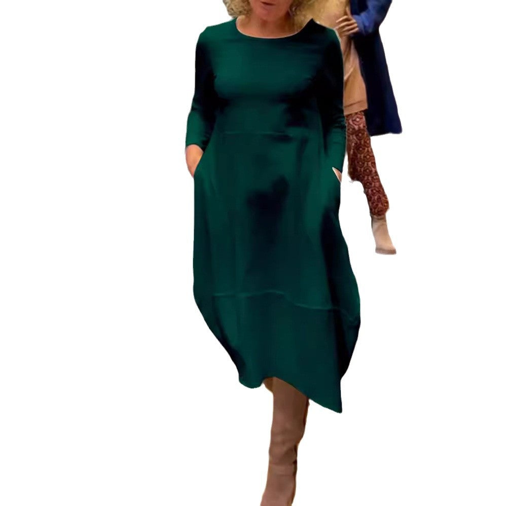 Women's asymmetrical balloon dress with three-quarter sleeves, side pockets, and flowing pointed hem Mune Fashion