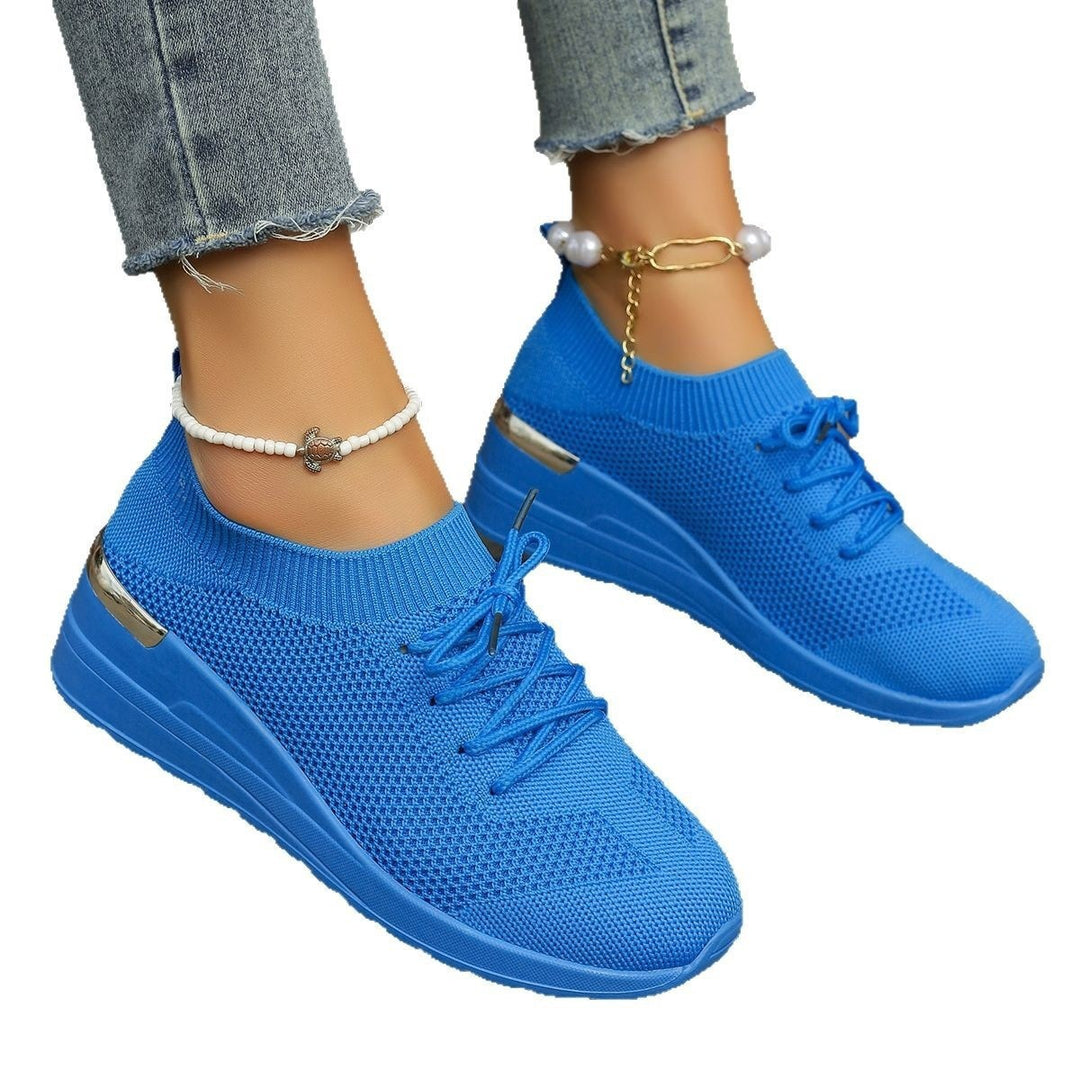 Women’s knit sneakers with wedge sole, sock-like shaft and metallic heel accent Mune Fashion