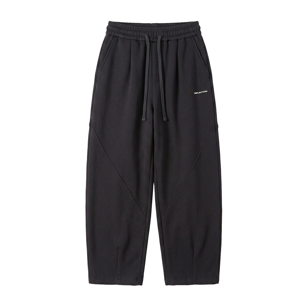 Men's loosely cut joggers with drawstring, decorative seams, and side pockets Mune Fashion