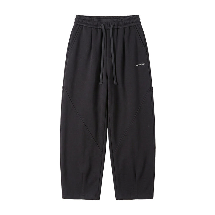Men's loosely cut joggers with drawstring, decorative seams, and side pockets Mune Fashion