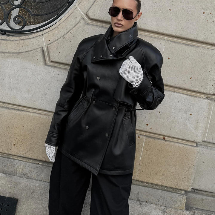 Women's rain jacket made of leather look with high stand-up collar, waist drawstring and snap button front Mune Fashion