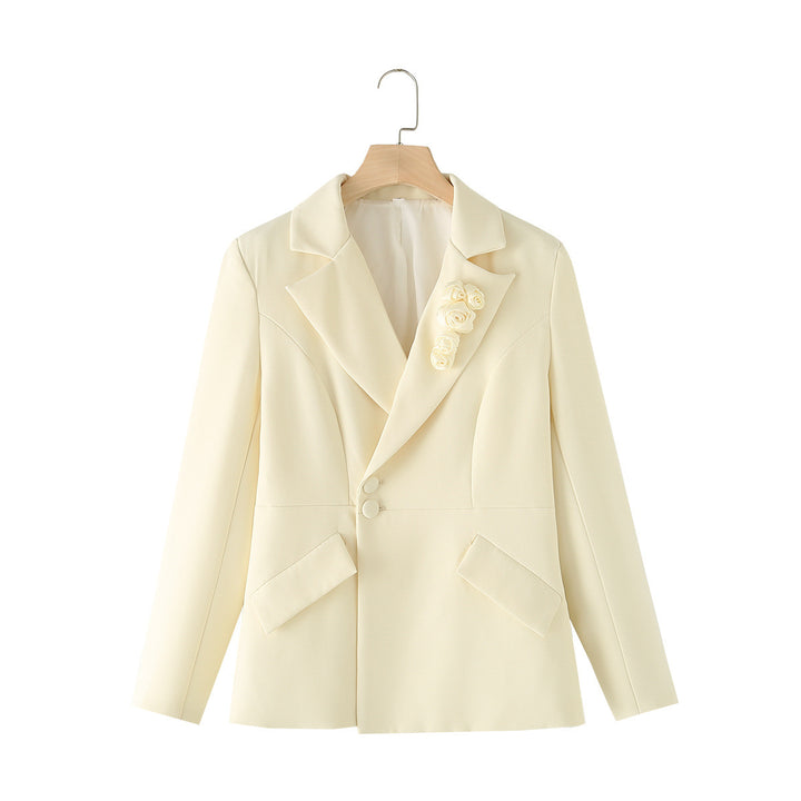 Women's tailored two-button blazer with decorative roses at the lapel and patch pockets Mune Fashion