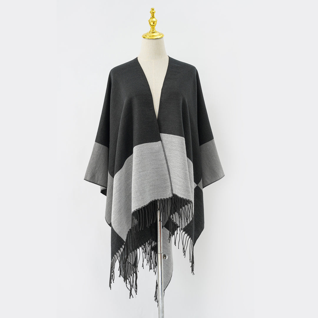 Women's Oversize Ruana made from wool blend with color block design and fringes Mune Fashion