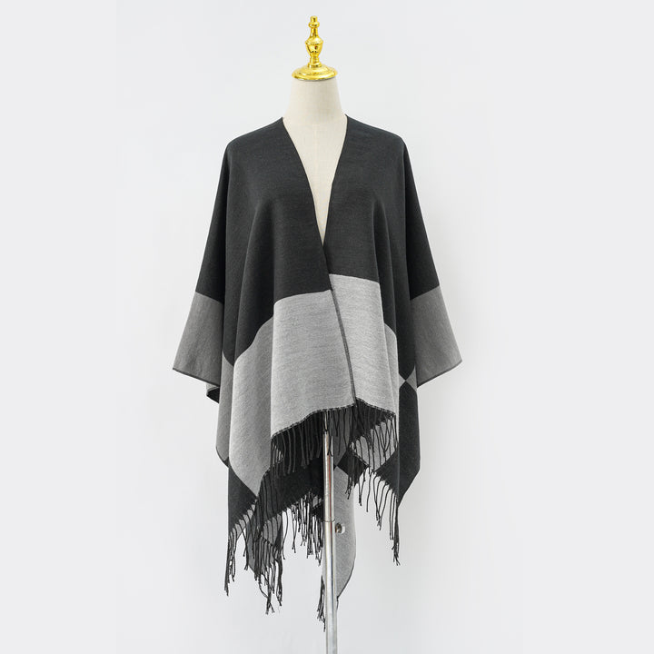 Women's Oversize Ruana made from wool blend with color block design and fringes Mune Fashion