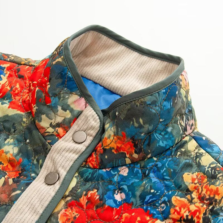 Women's quilted blouson jacket with abstract floral print and contrast piping Mune Fashion