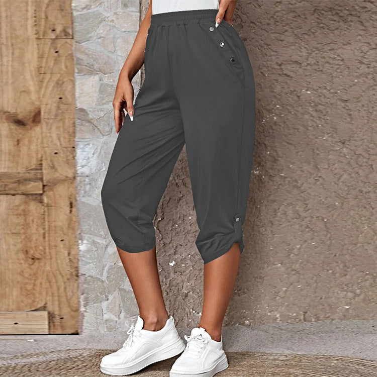 Women's casual three-quarter length pants with elastic waistband, side pockets and roll-up hem Mune Fashion