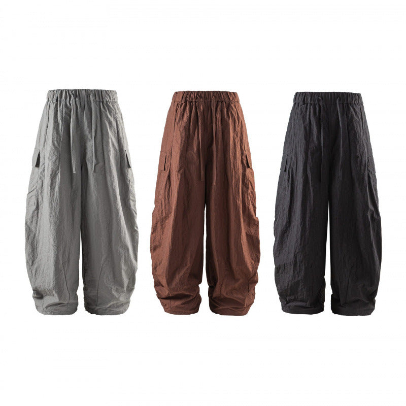 Unisex Wide Cropped Cargo Pants with Elastic Waistband, Drawstring and Overlay Pockets Mune Fashion