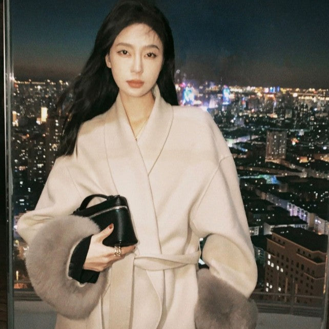 Women's Long Wool Blend Coat with Waist Belt and Voluminous Fur Trim at Sleeve Ends Mune Fashion