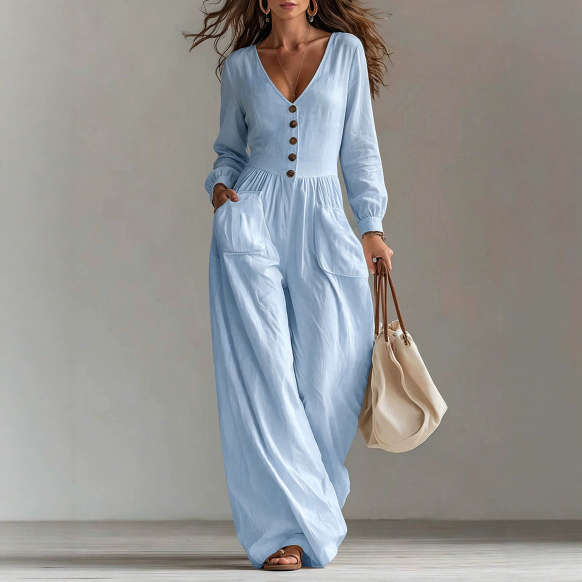 Ladies linen jumpsuit with V-neck, button placket and wide leg cut Mune Fashion