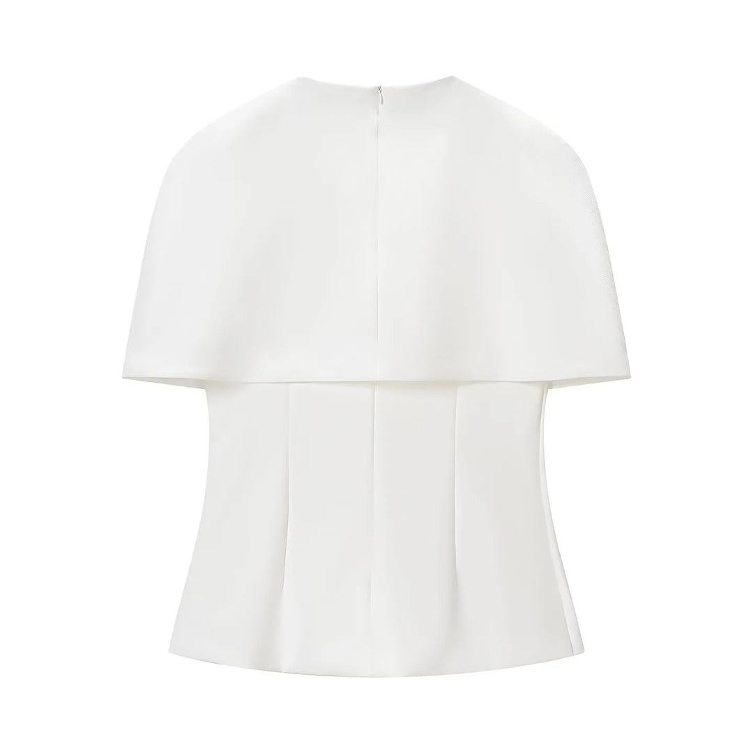 Women's sleeveless cape top with tailored peplum and textured crepe quality Mune Fashion