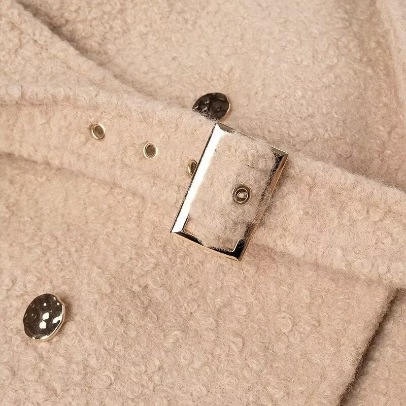 Women long cut bouclé teddy coat in oversized cut with double button front and adjustable sleeve straps Mune Fashion