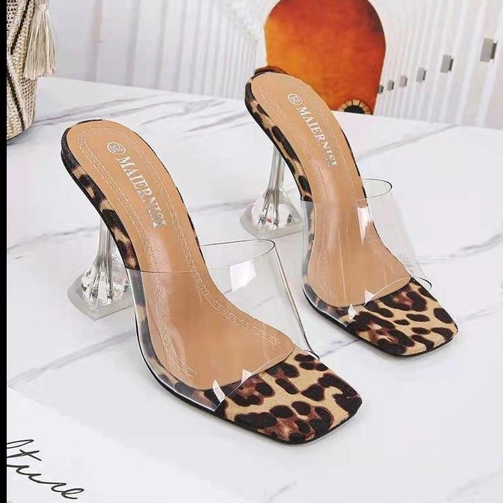 Women’s transparent slip-on mule with PVC straps, sculptural plexiglass heel, and padded insole Mune Fashion