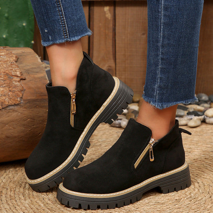 Women's ankle-high boot with decorative zipper, padded shaft, and sturdy profile sole Mune Fashion