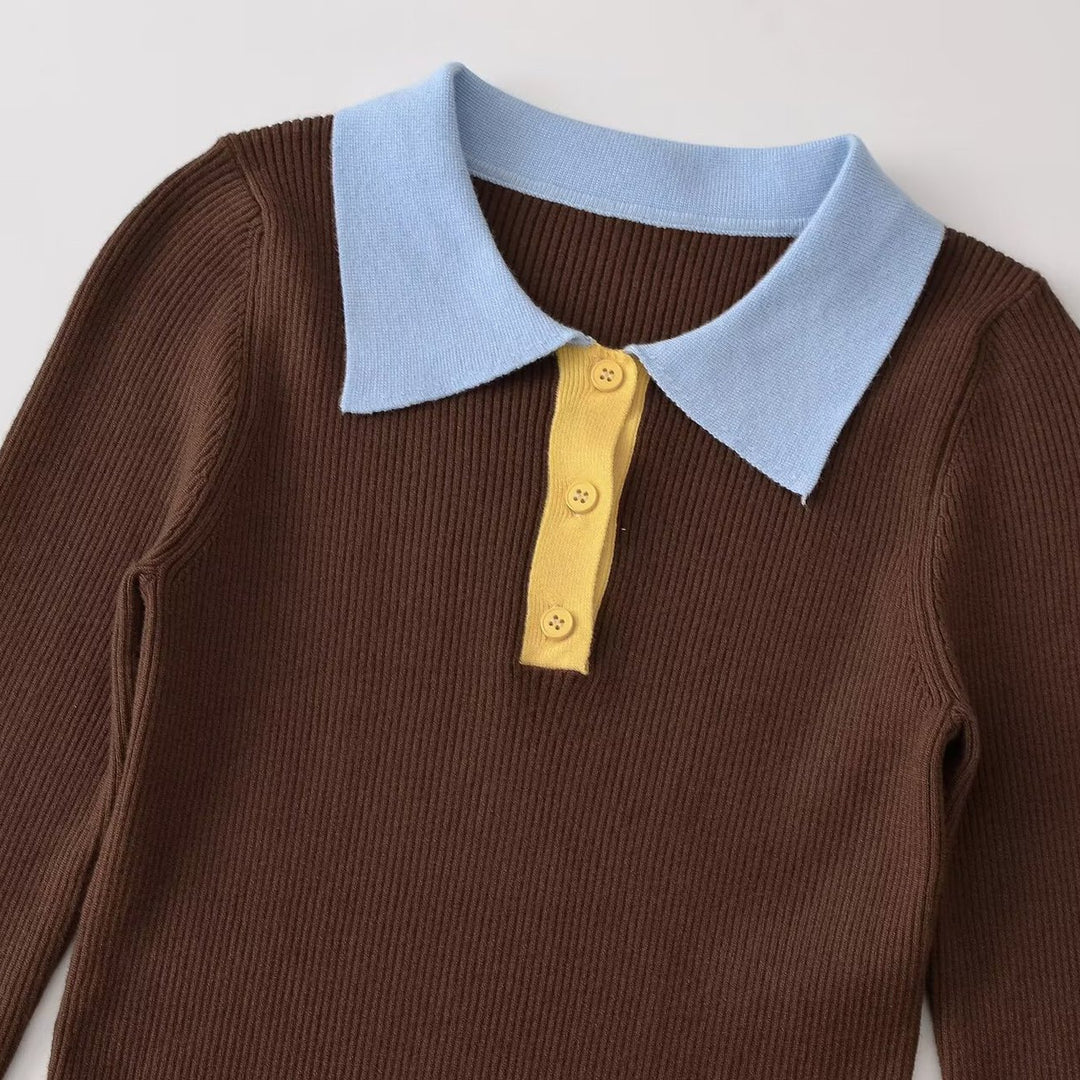 Women's figure-hugging ribbed knit sweater with polo collar, button placket, and color block details Mune Fashion