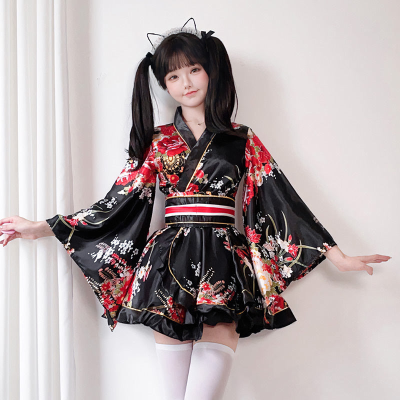 Ladies Kimono Dress with a playful cut and floral accents Mune Fashion
