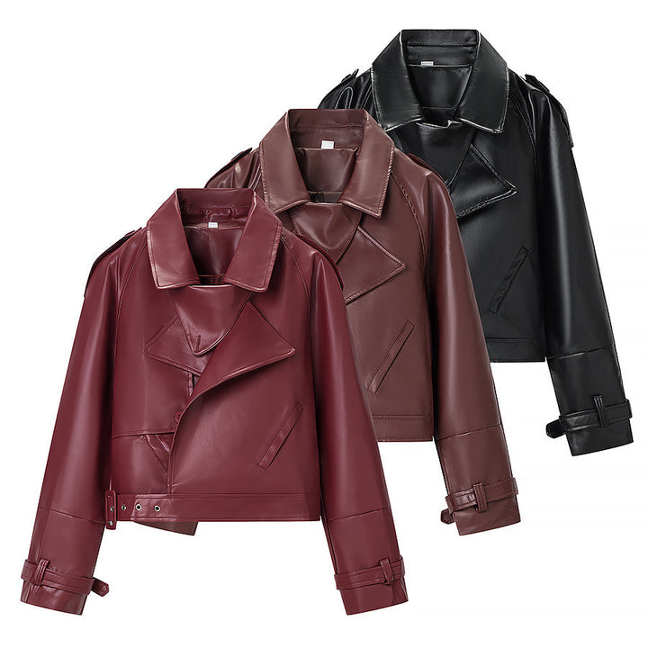 Women short cut biker jacket in leather look with asymmetrical lapel and waist belt Mune Fashion
