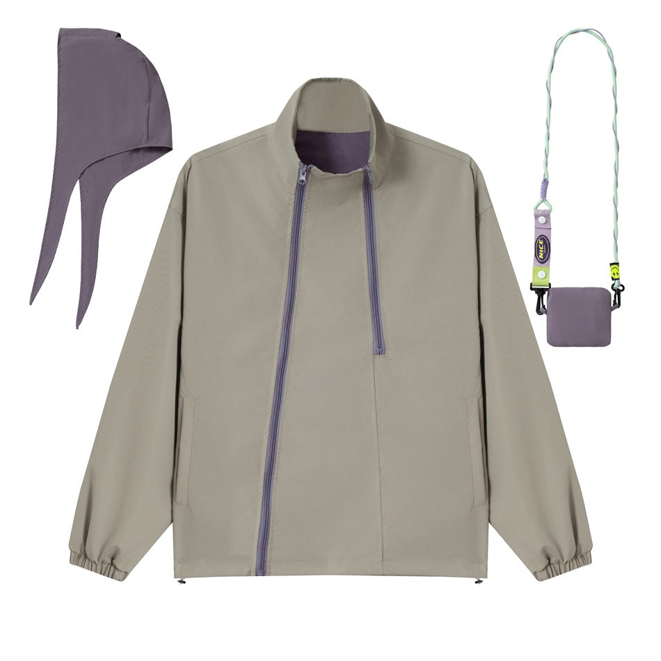 Unisex short cut technical windbreaker with asymmetric two-way zipper, detachable storm hood and shoulder mini bag Mune Fashion