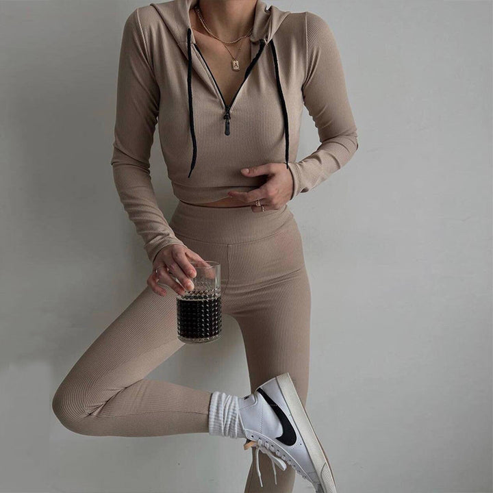 Women's fitted rib jersey half-zip set with tailored long sleeve and high-waist leggings Mune Fashion