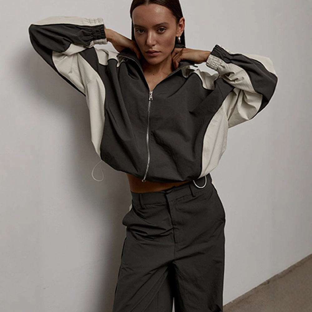 Women's oversized sporty track jacket with high stand-up collar and raglan sleeves Mune Fashion