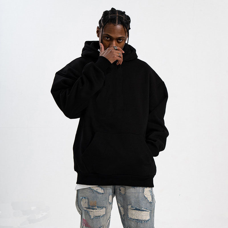 Unisex minimalist oversized hoodie with double hood, dropped shoulder, and wide ribbed hem Mune Fashion