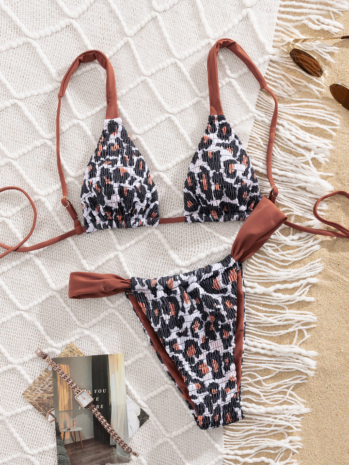 Ladies triangle bikini with ruffles and fine animal print Mune Fashion