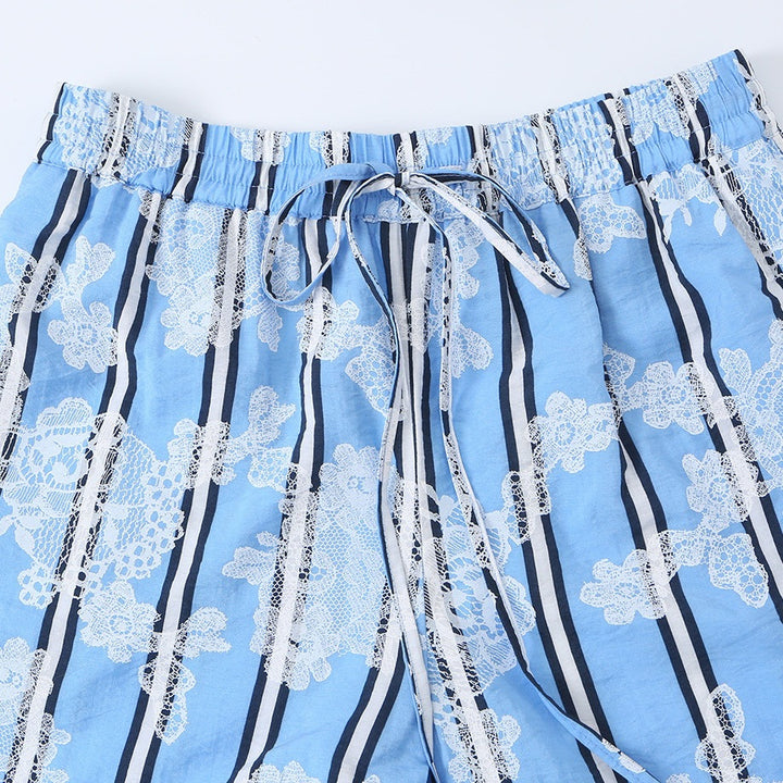 Women's wide palazzo pants with elastic drawstring waistband and floral lace look Mune Fashion