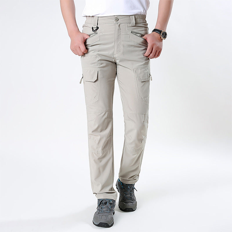 Men's nano technical trekking pants with elastic waistband, pre-shaped knees, and multiple cargo and zip pockets.